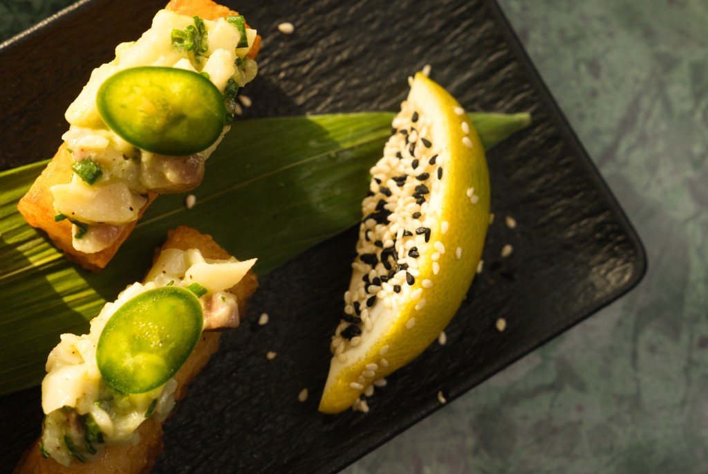 Crispy rice small plates with seafood tartare and jalapeño